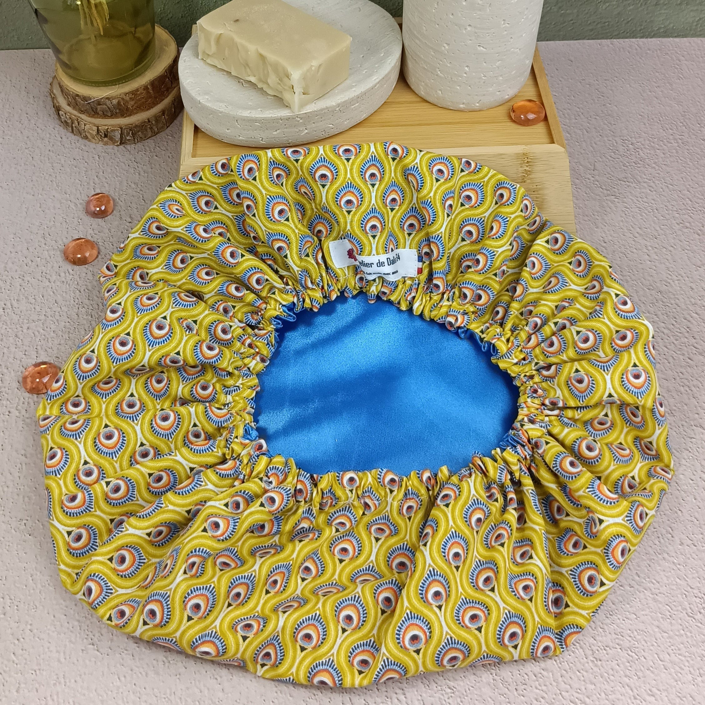 Bonnet de soin cheveux paon jaune