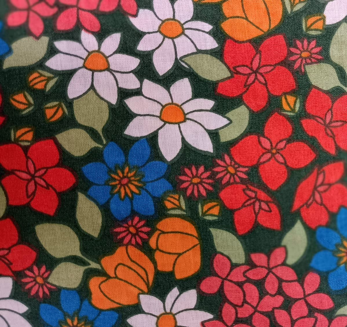 Fleur orange fond vert