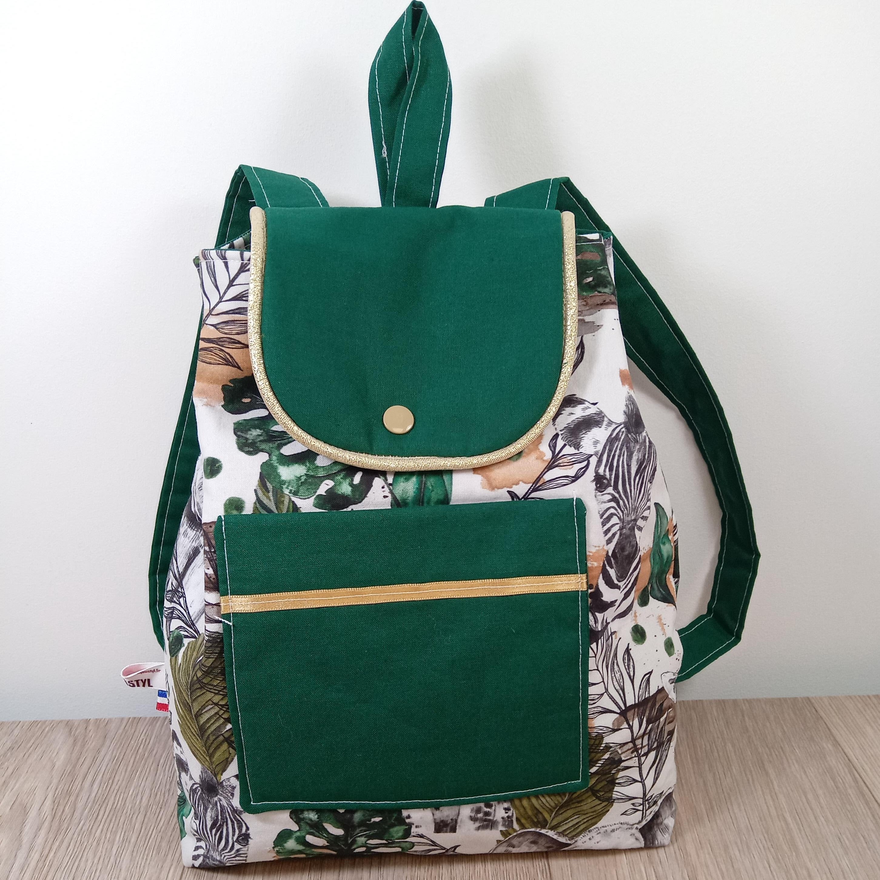Sac à dos enfant de 0 à 5 ans thème la savane couleur vert et blanc