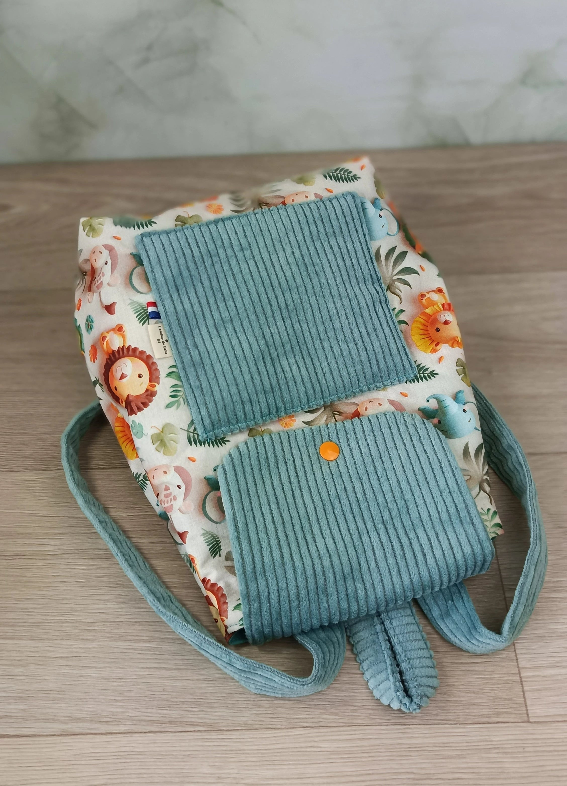 Sac à dos et serviette de cantine Safari