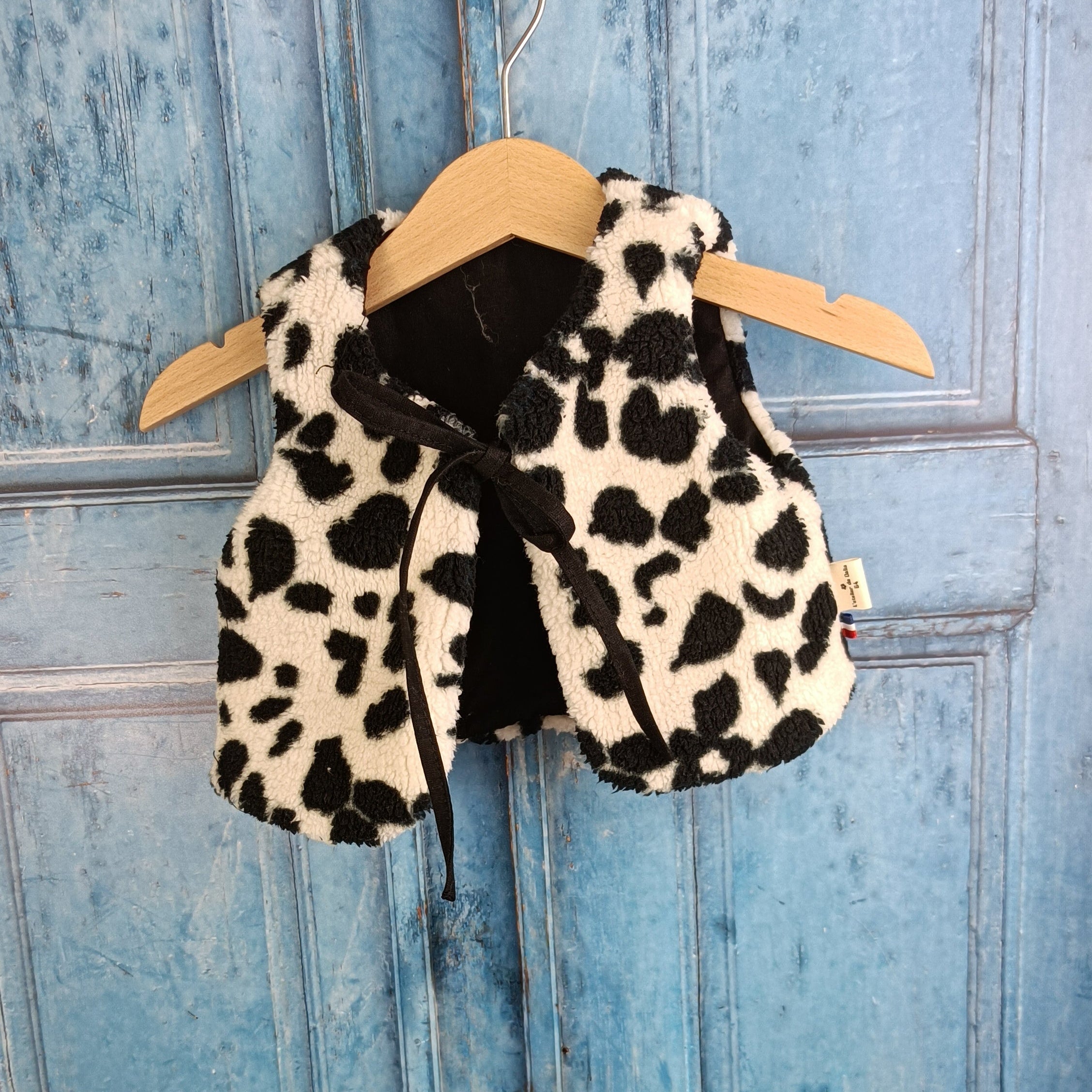 Gilet berger bébé sherpa tacheté noir et blanc 