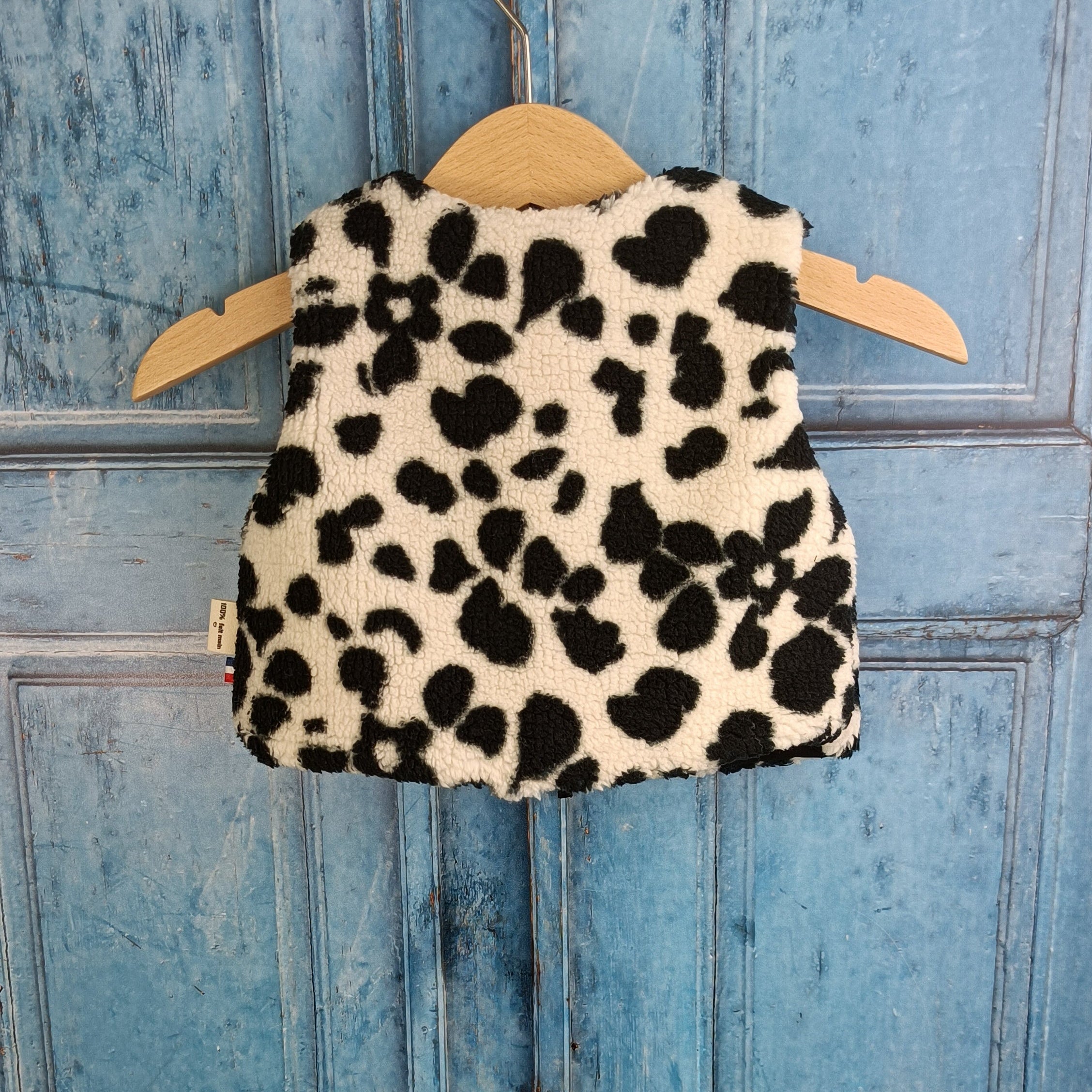 Gilet berger bébé sherpa tacheté noir et blanc 