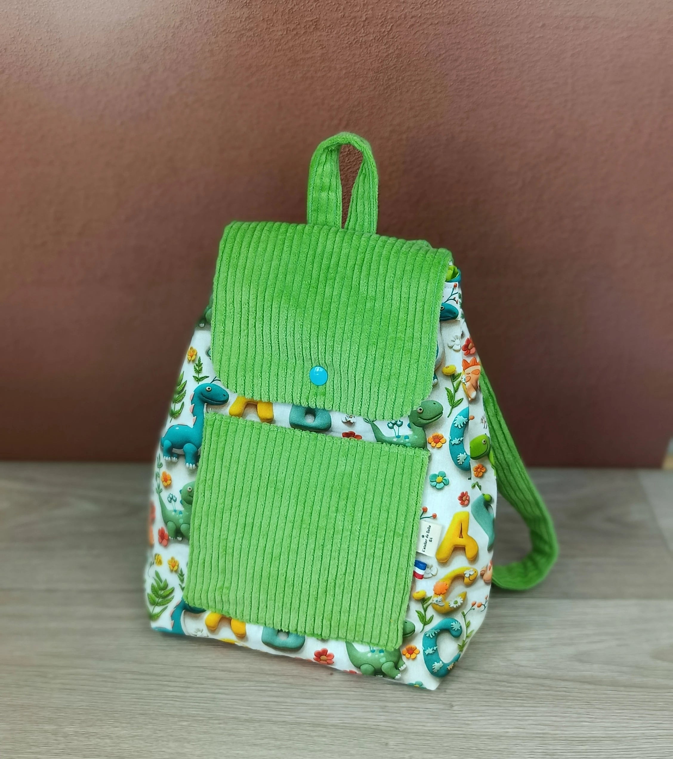 Sac à dos et serviette de cantine Dino baby