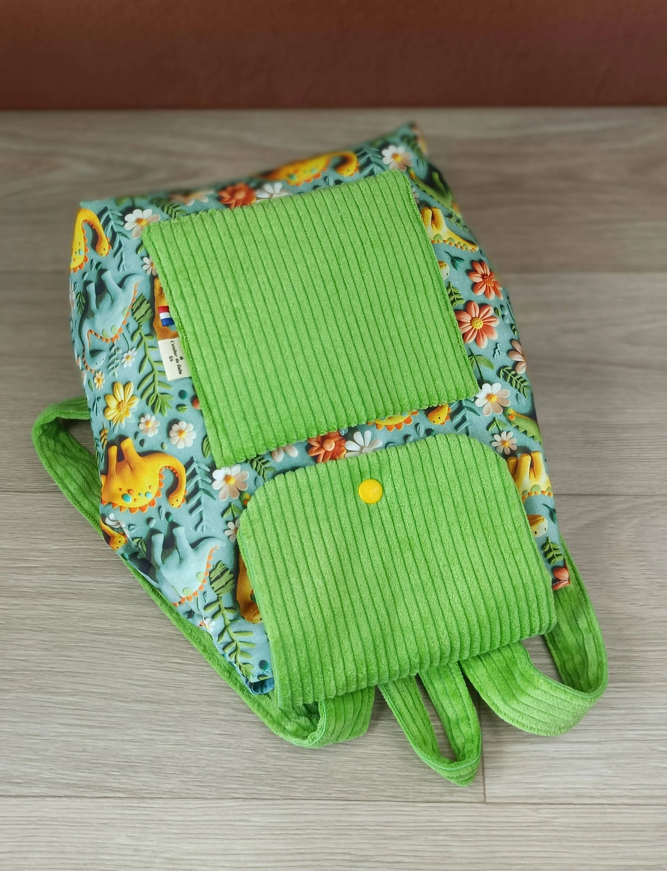 Sac à dos et serviette de cantine Dino ver
