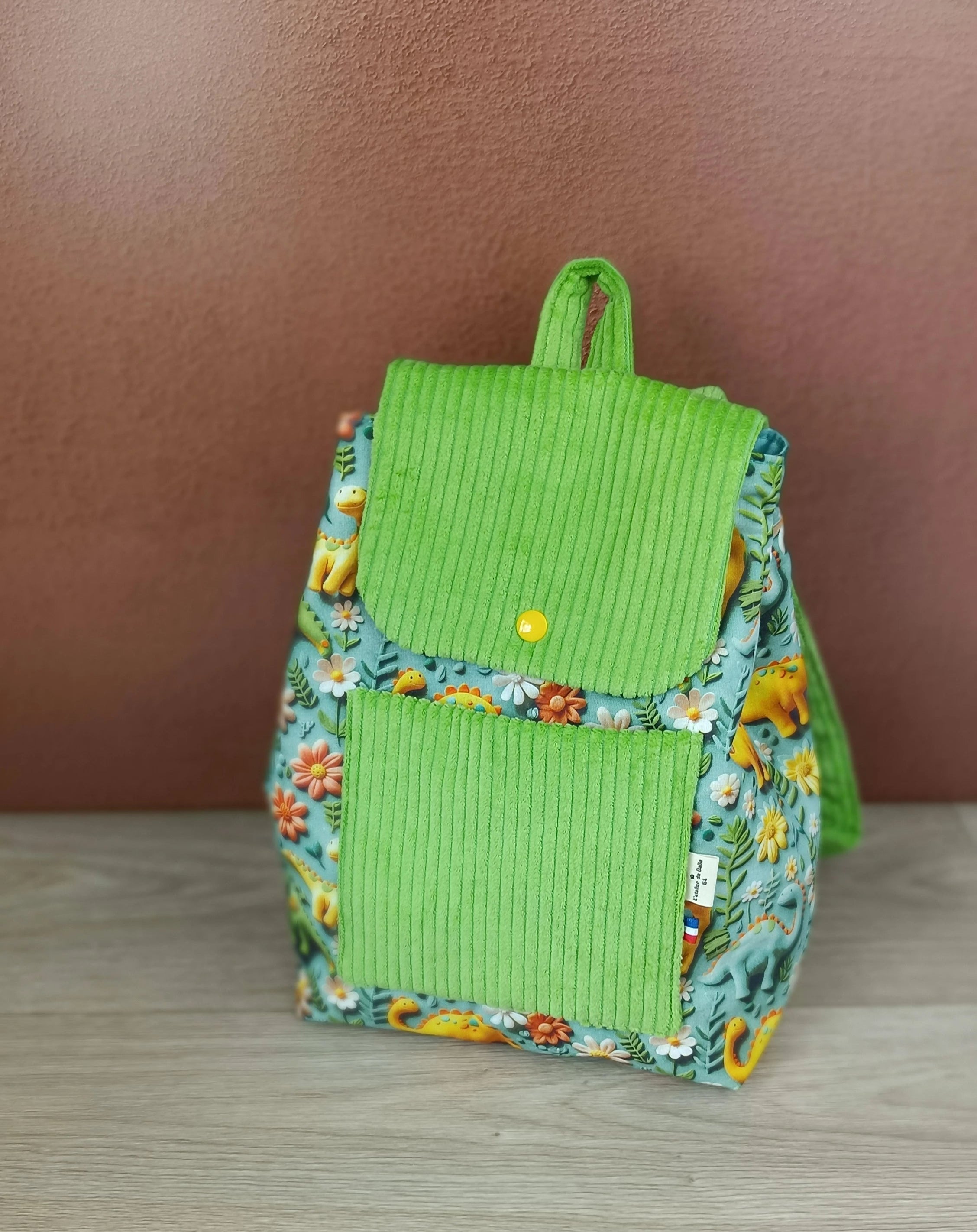 Sac à dos et serviette de cantine Dino ver