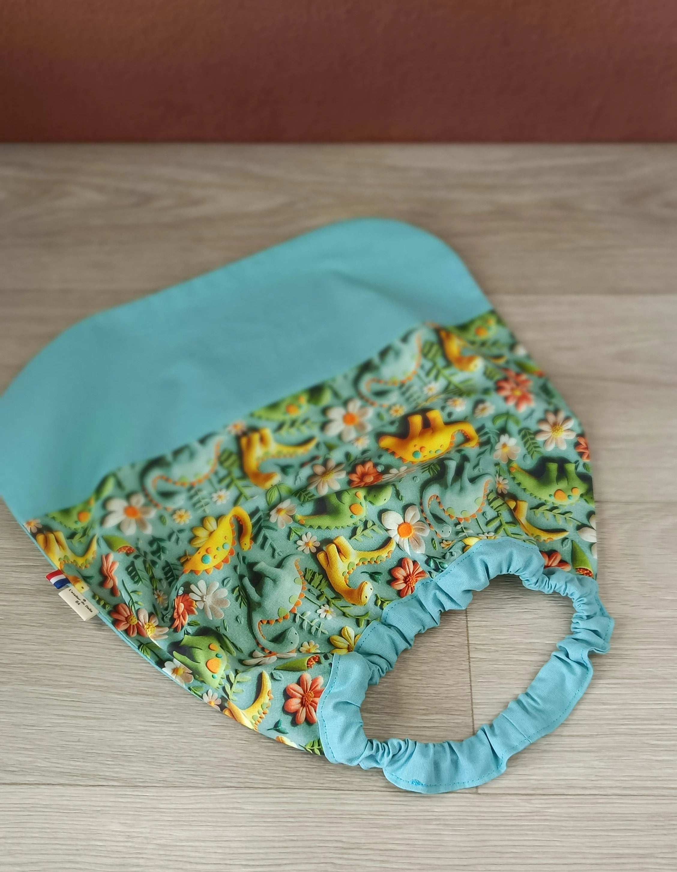 Sac à dos et serviette de cantine Dino vert