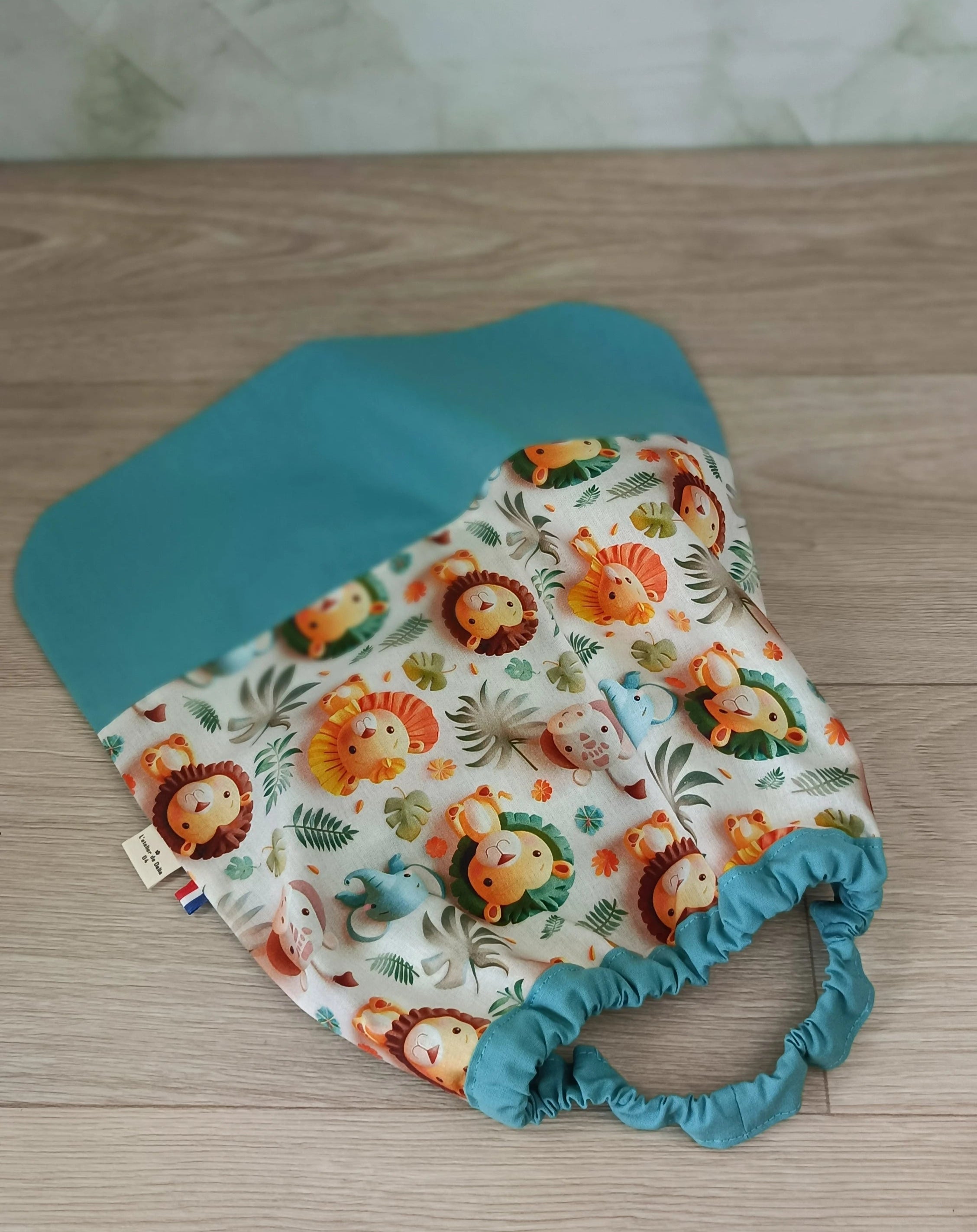 Sac à dos et serviette de cantine Safari